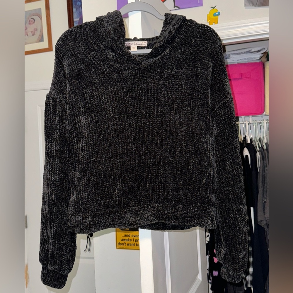 Black knit hoodie that was never worn! Tag is still intact!